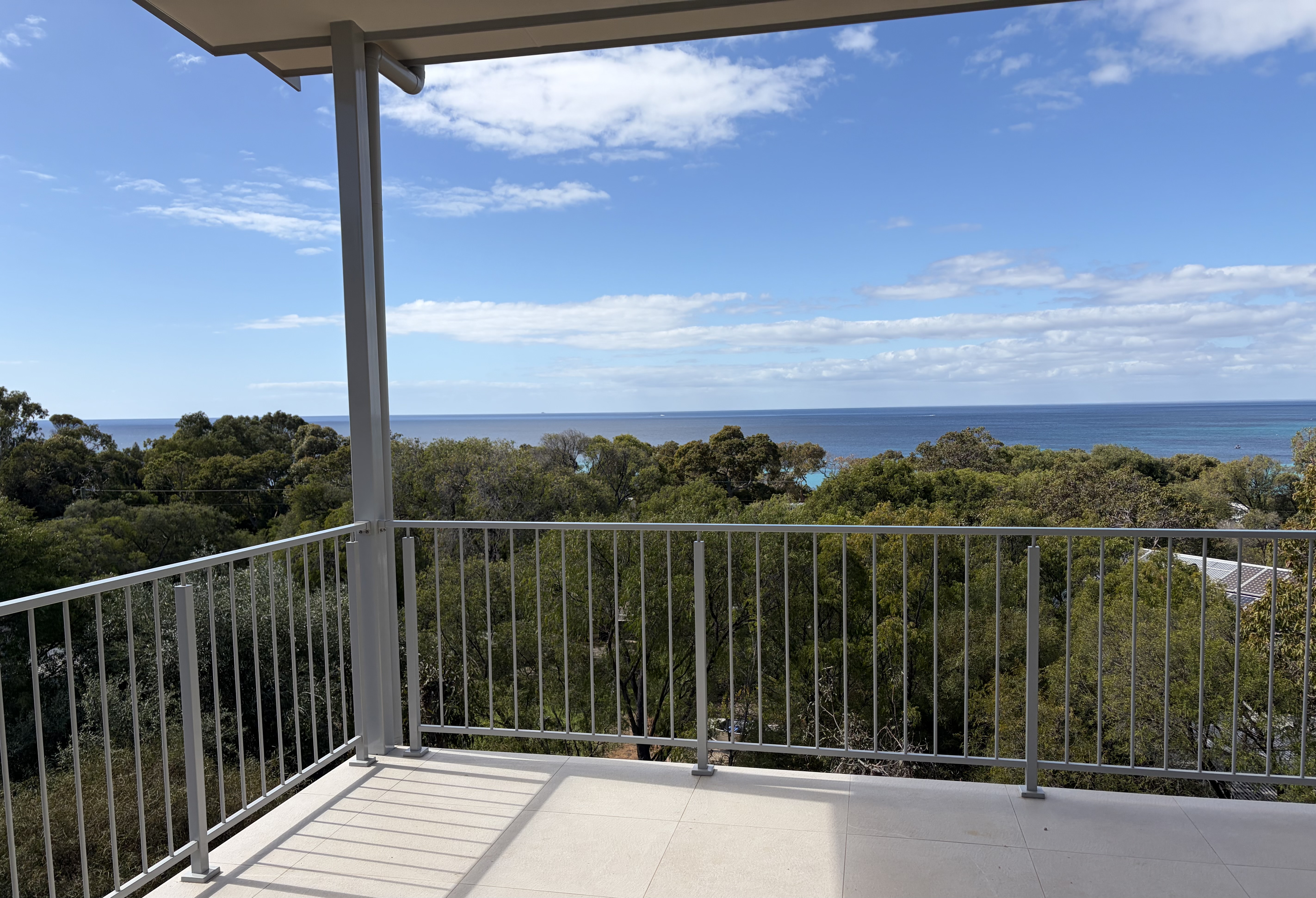 Upper deck balcony with panoramic ocean and bay views