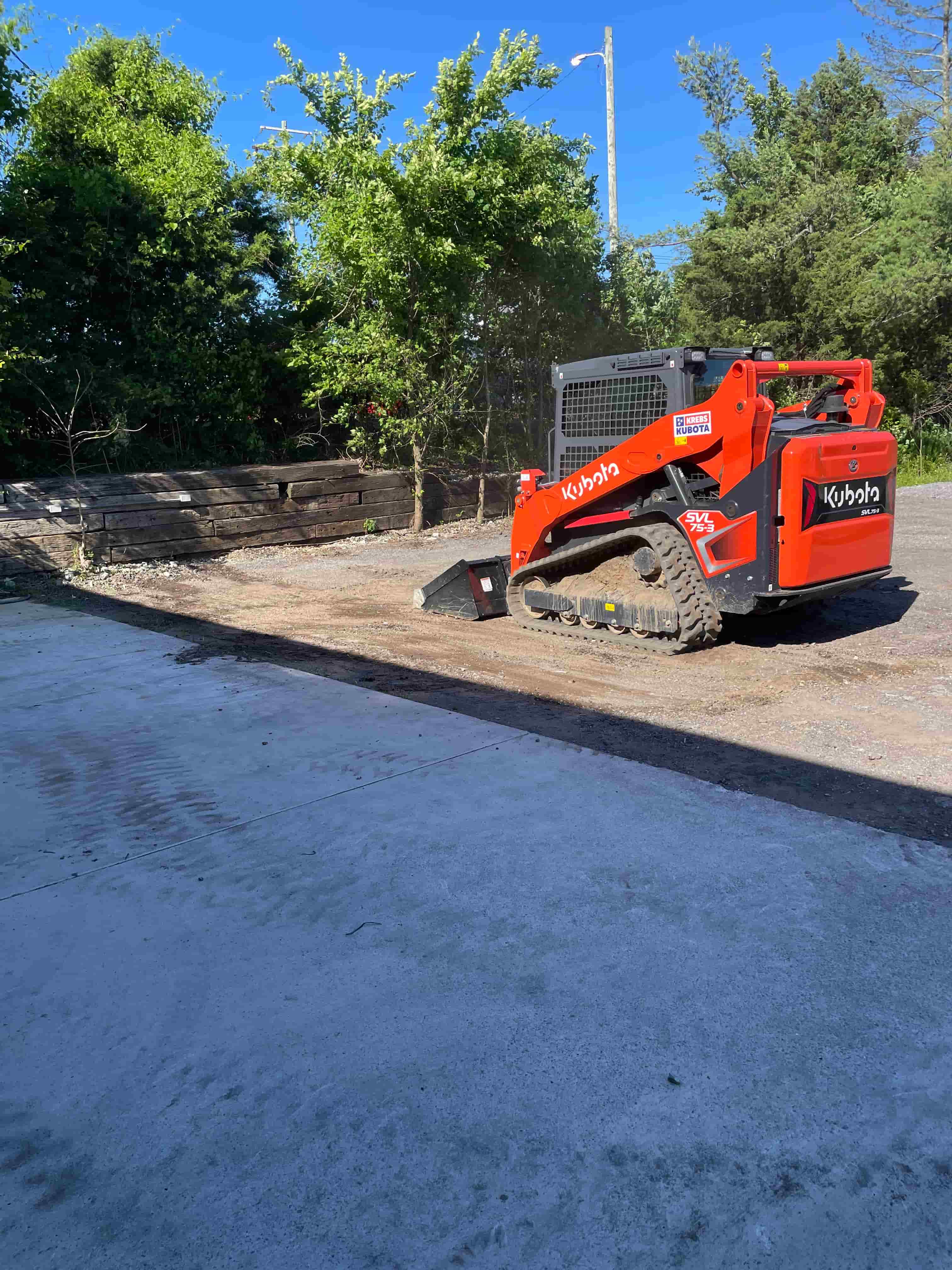 Kubota SVL75-3 skid steer loader for excavation and site preparation