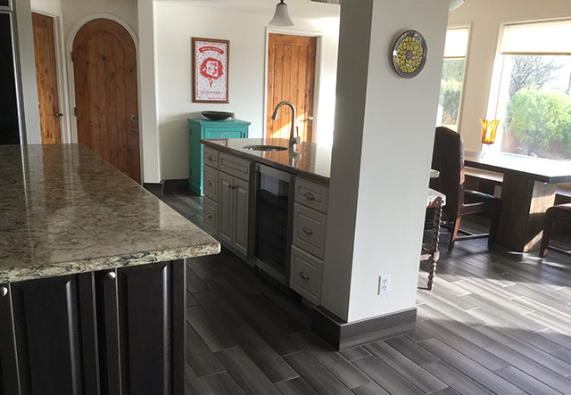 Beverage center island with built-in drink refrigerator and prep sink
