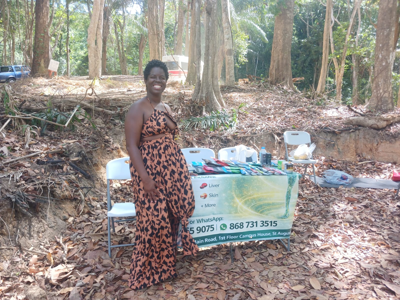 Natural health practitioner with liver and skin wellness products display