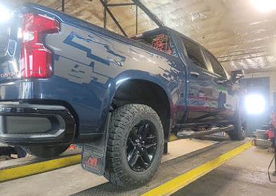 Lifted Truck Undercarriage Inspection