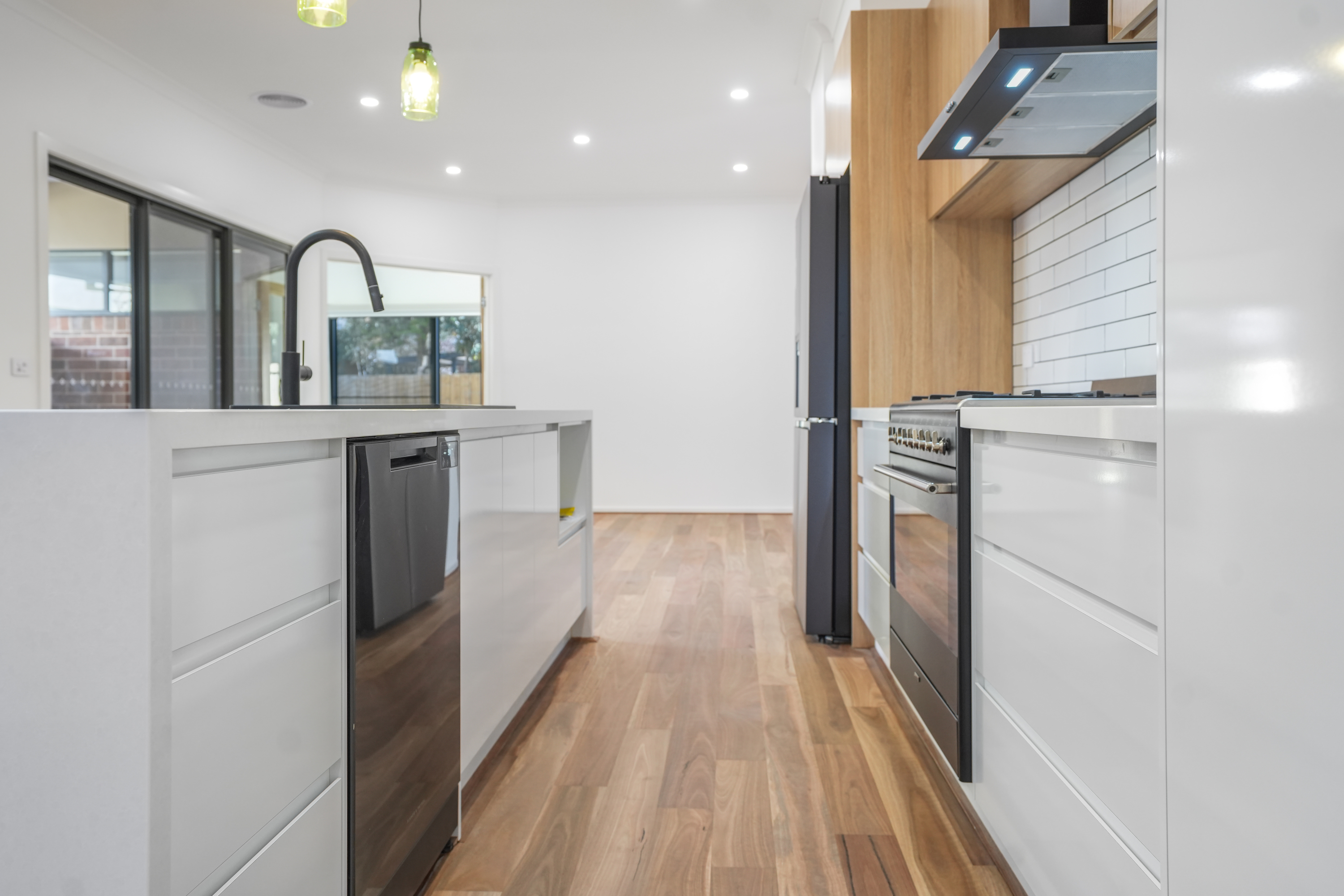 Modern kitchen renovation by ONQ Building Group