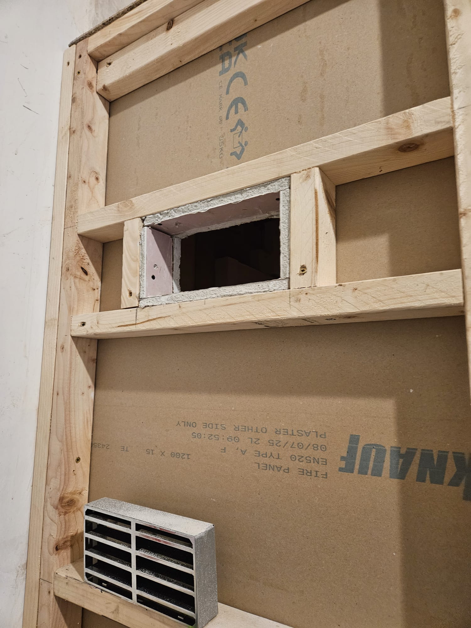 Knauf fire panel installation with certified EN520 Type A fire-resistant boards and ventilation grille