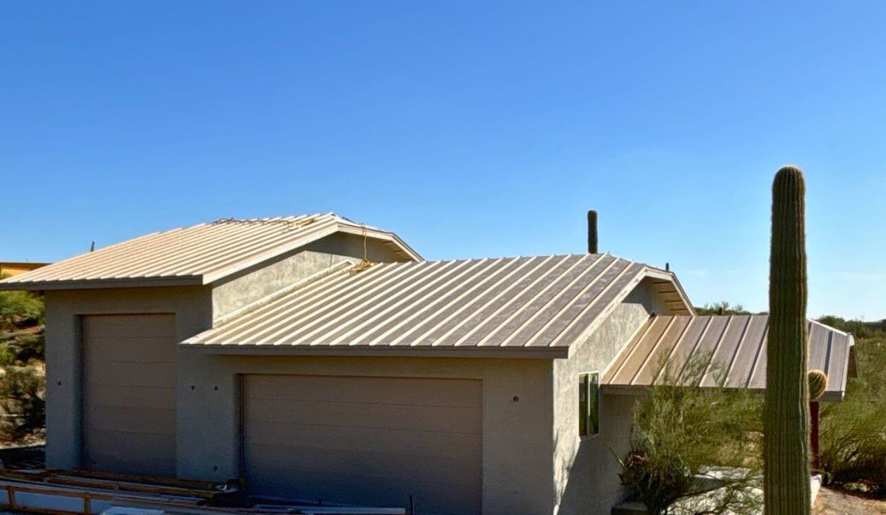 Cave Creek Standing Seam Metal Roof • Light Gray Panels on Stucco Desert Home with Saguaro Cactus