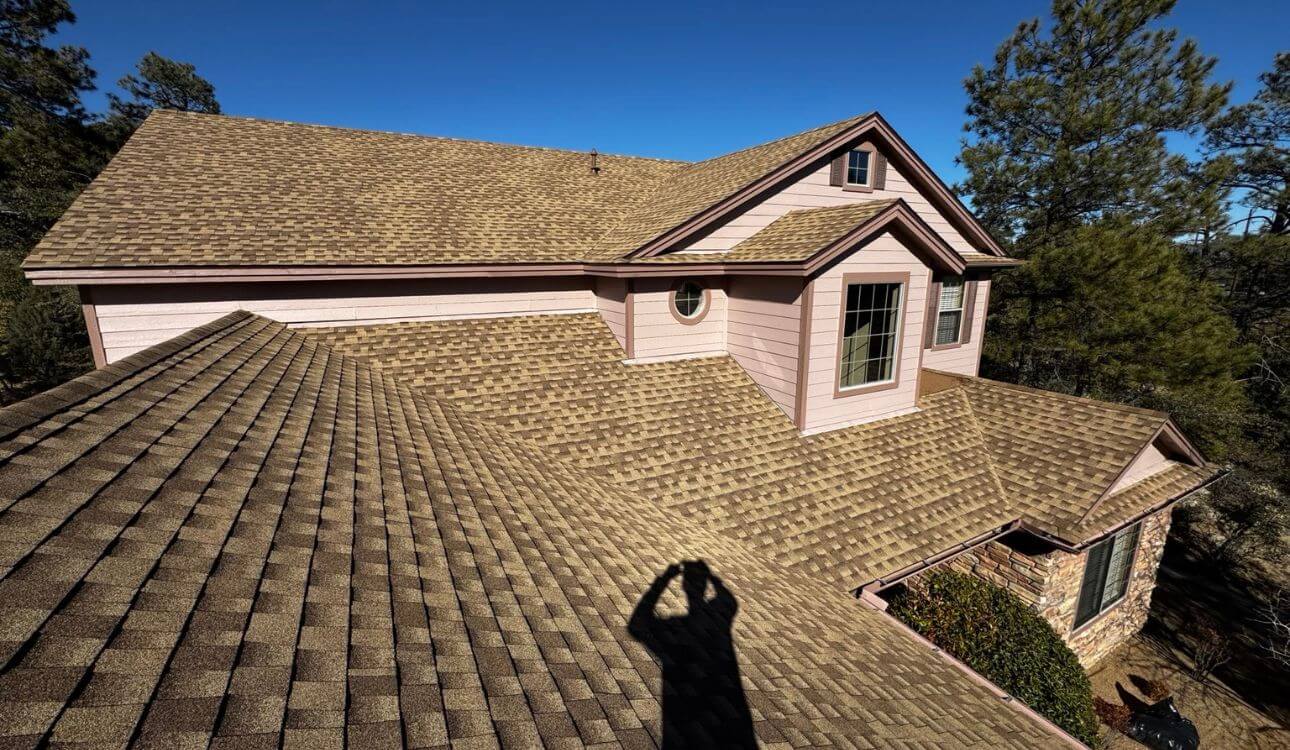 Yavapai Roofing team completing a residential asphalt shingle roof replacement in Prescott Arizona