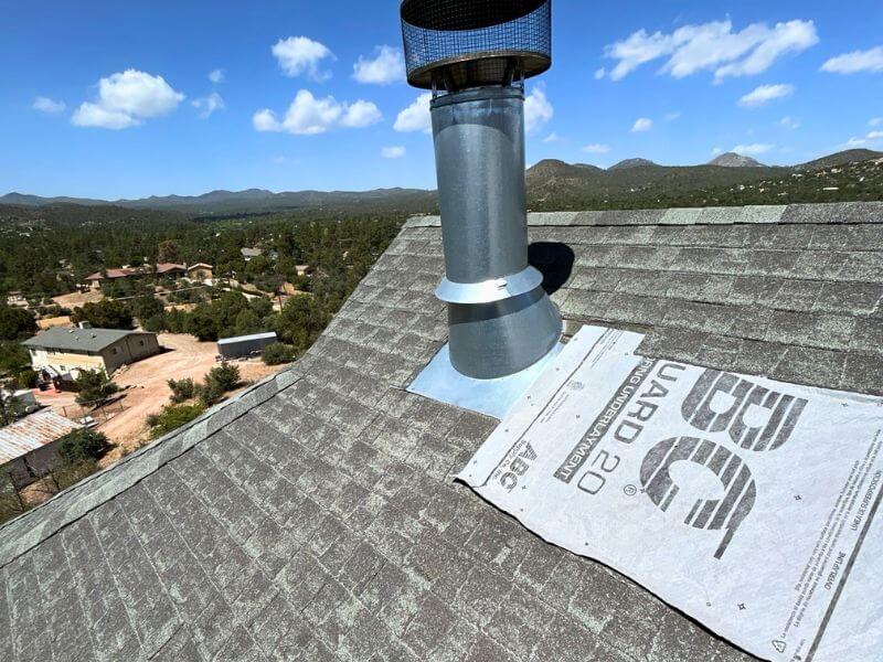 Aged and deteriorated asphalt shingle roof in Prescott Arizona before replacement