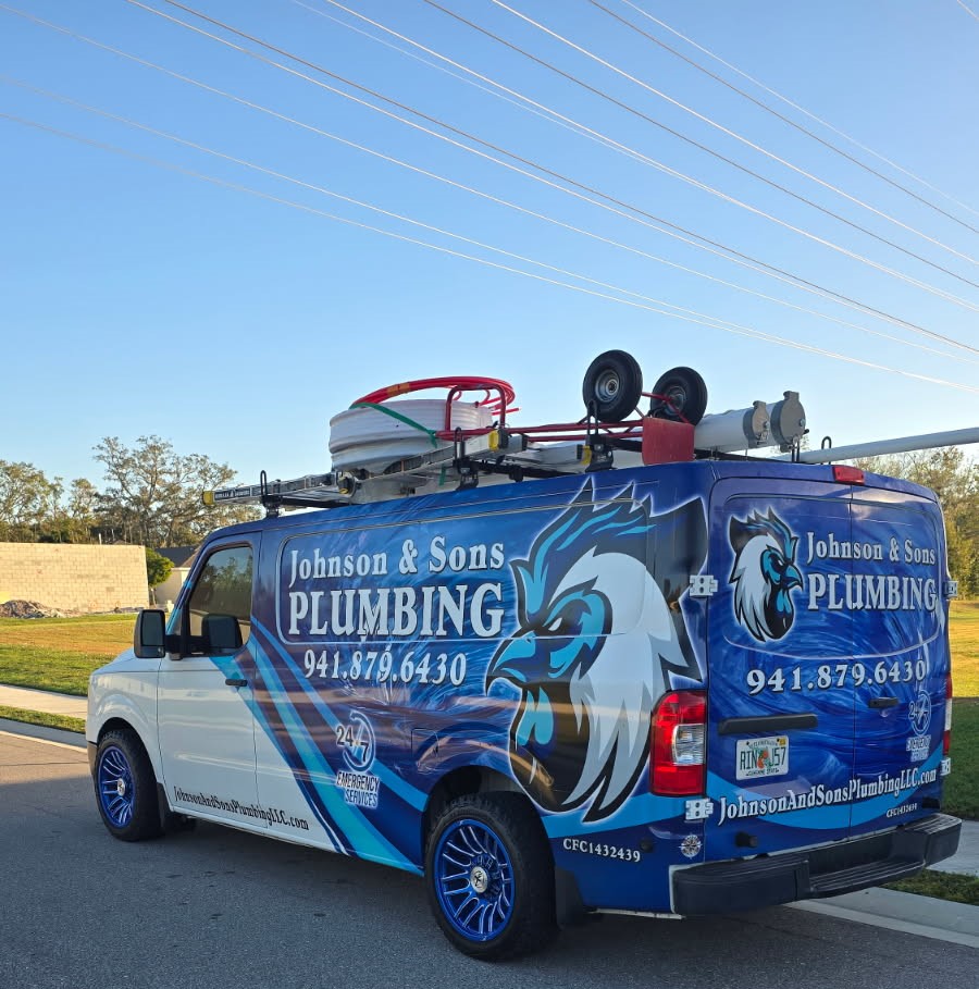Johnson & Sons Plumbing service van with custom rooster logo wrap, fully equipped for residential plumbing in Sarasota Florida