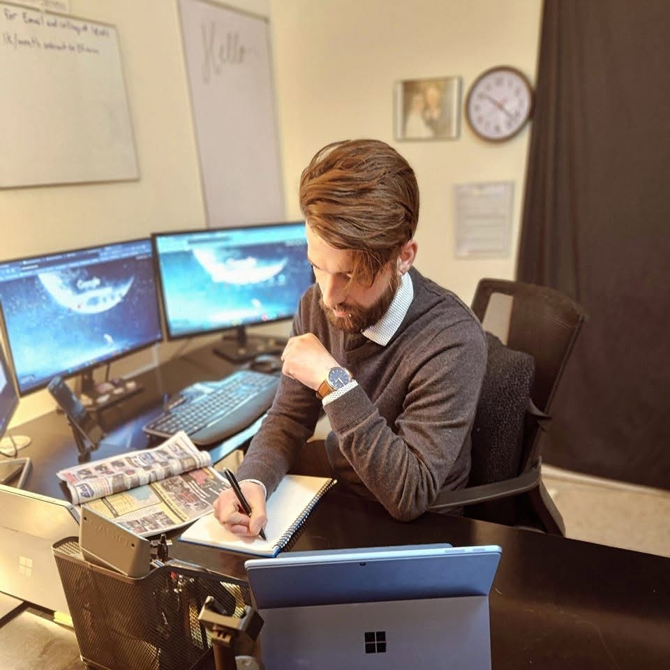 Jeremy Pagel at his desk building digital systems
