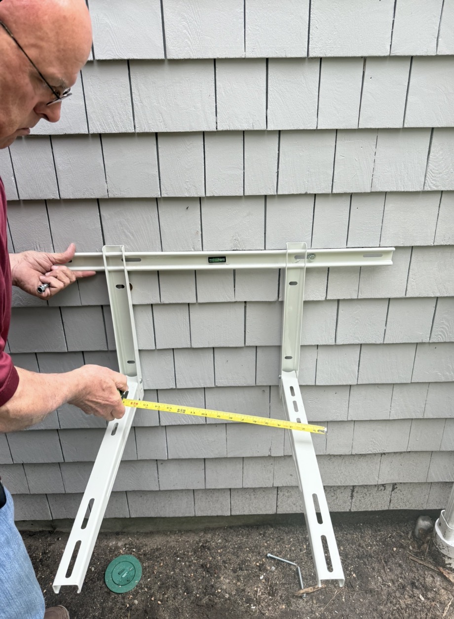 Before: Measuring and installing mounting brackets for new mini-split system