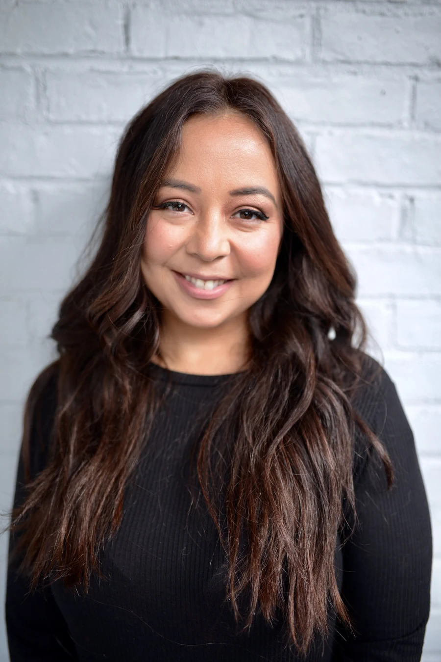 Portrait of Jessica Young — Bellami Certified hair extension specialist and custom color specialist at her Schenectady, NY studio