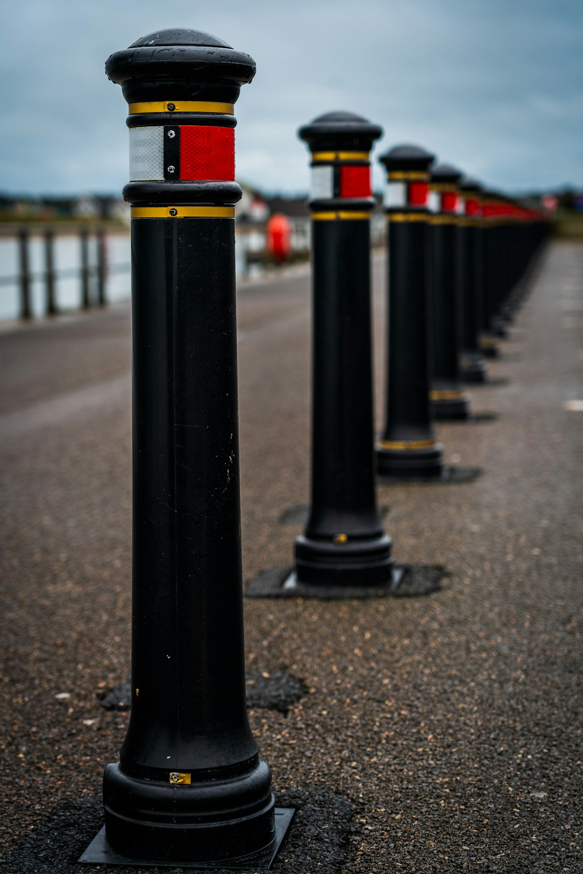 Row of steel bollards protecting a building entrance in Arlington TX
