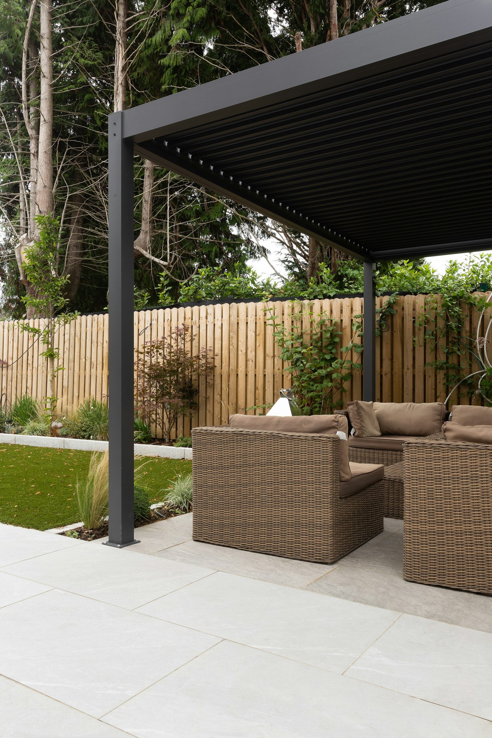 Covered patio with seating under a solid patio cover in Arlington TX