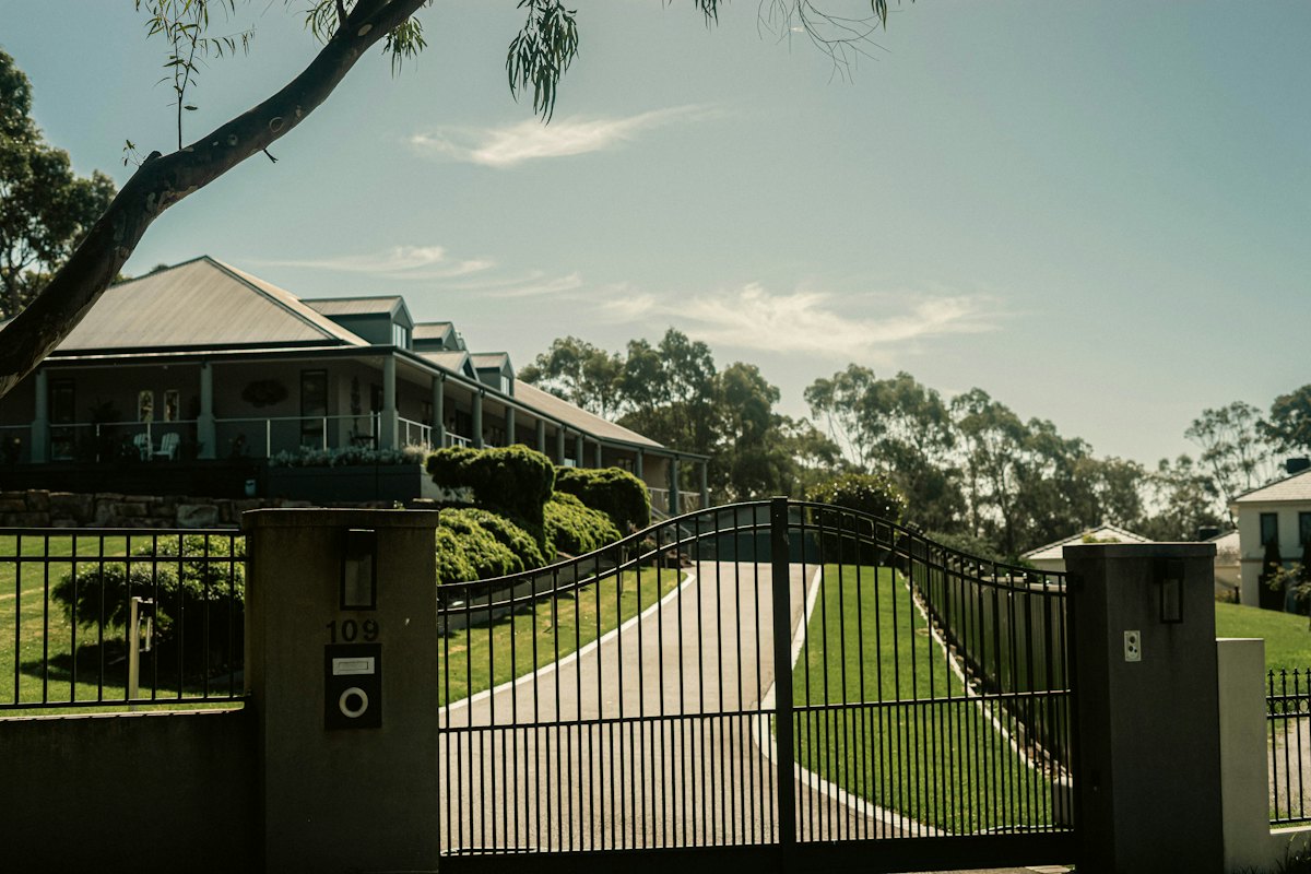 Automatic driveway gate at a residential entrance in Arlington TX