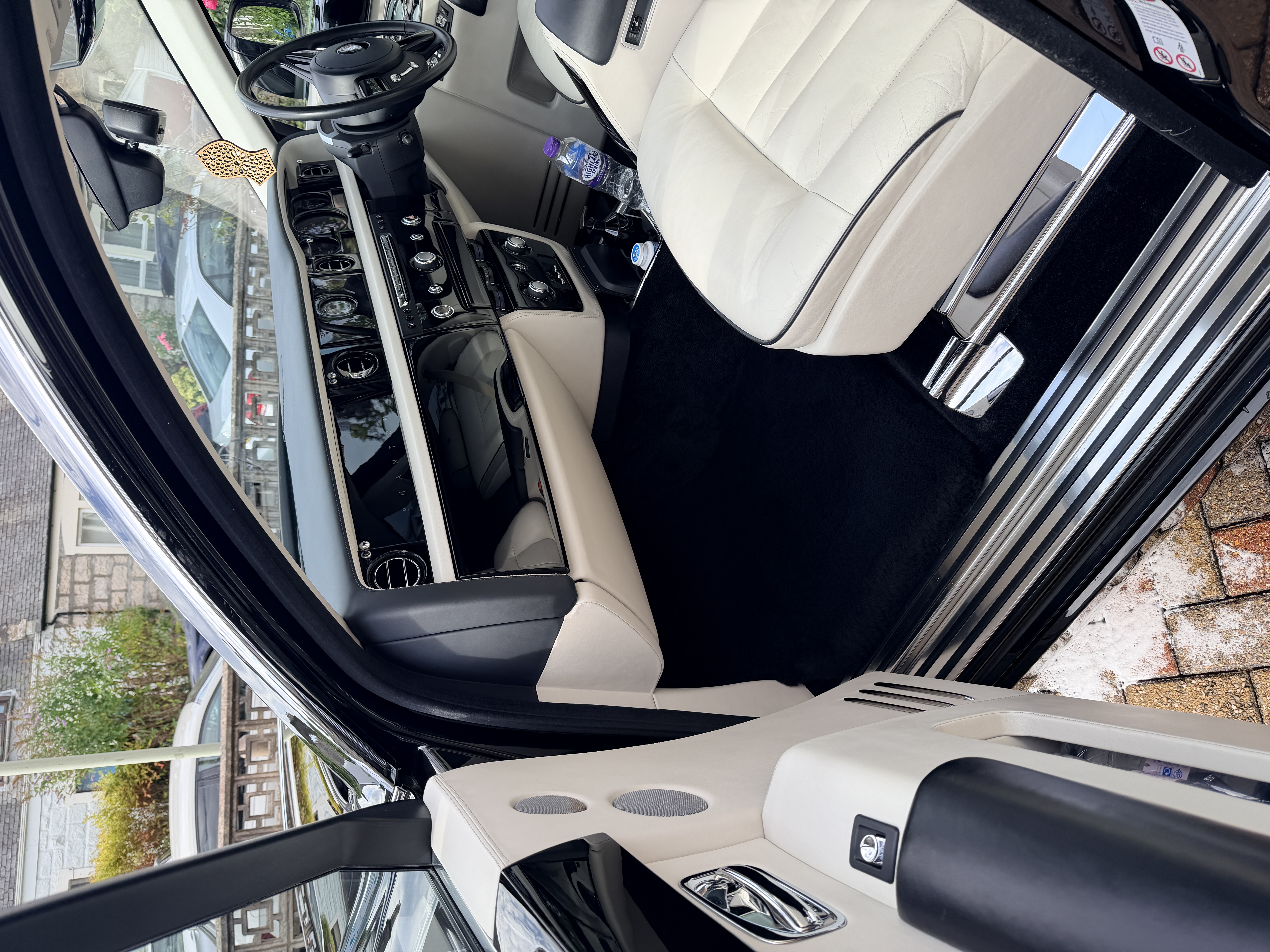 Rolls-Royce luxury cream leather interior and handcrafted dashboard detailed by Tidy Job