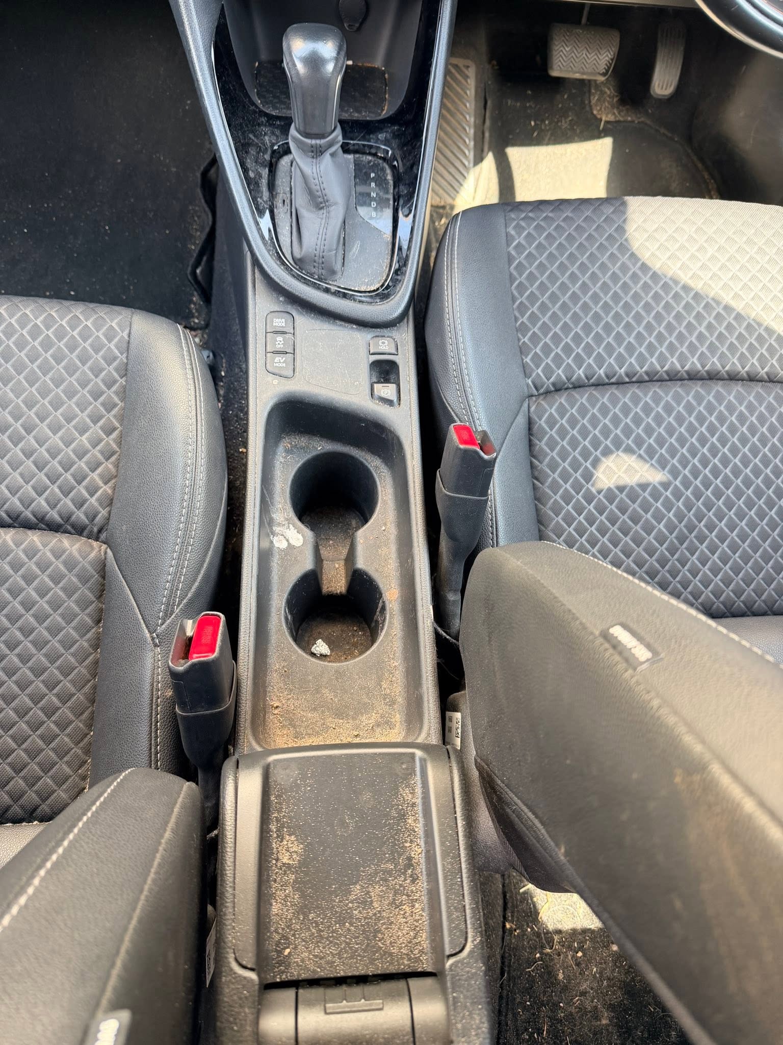 Toyota Yaris — Interior Console & Cabin Clean — before valeting, showing dirt and contamination