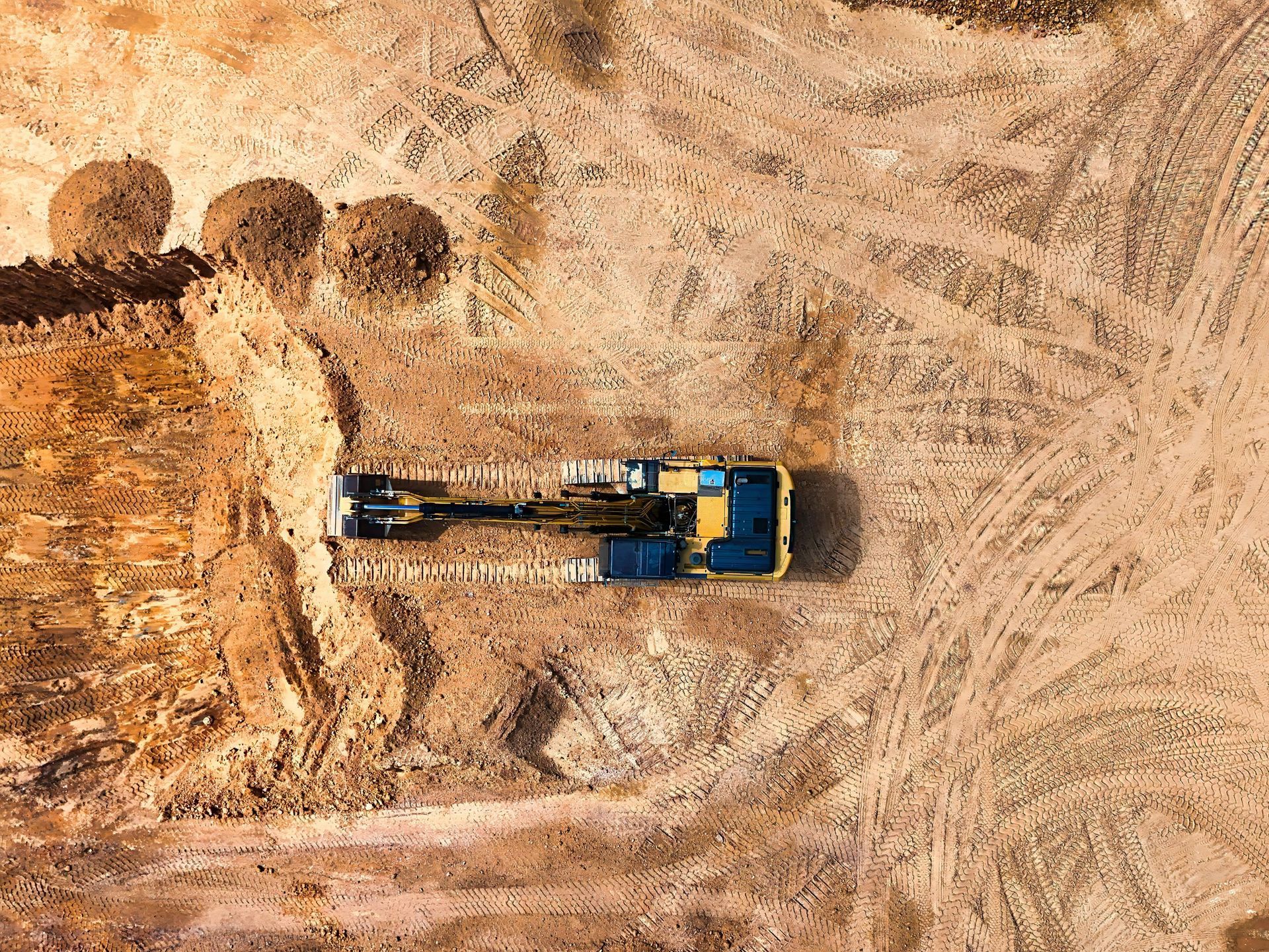 Heavy machinery doing earthwork and land grading