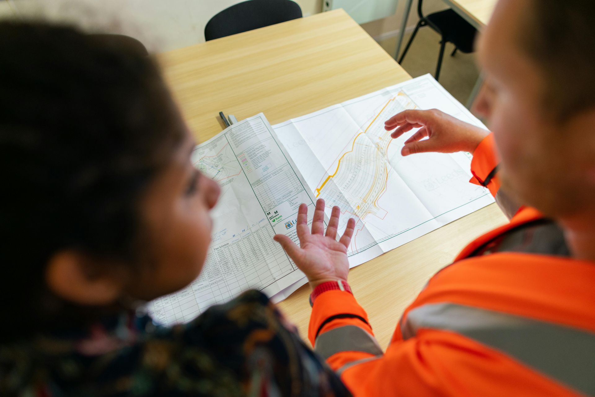 Engineers reviewing stormwater drainage layout