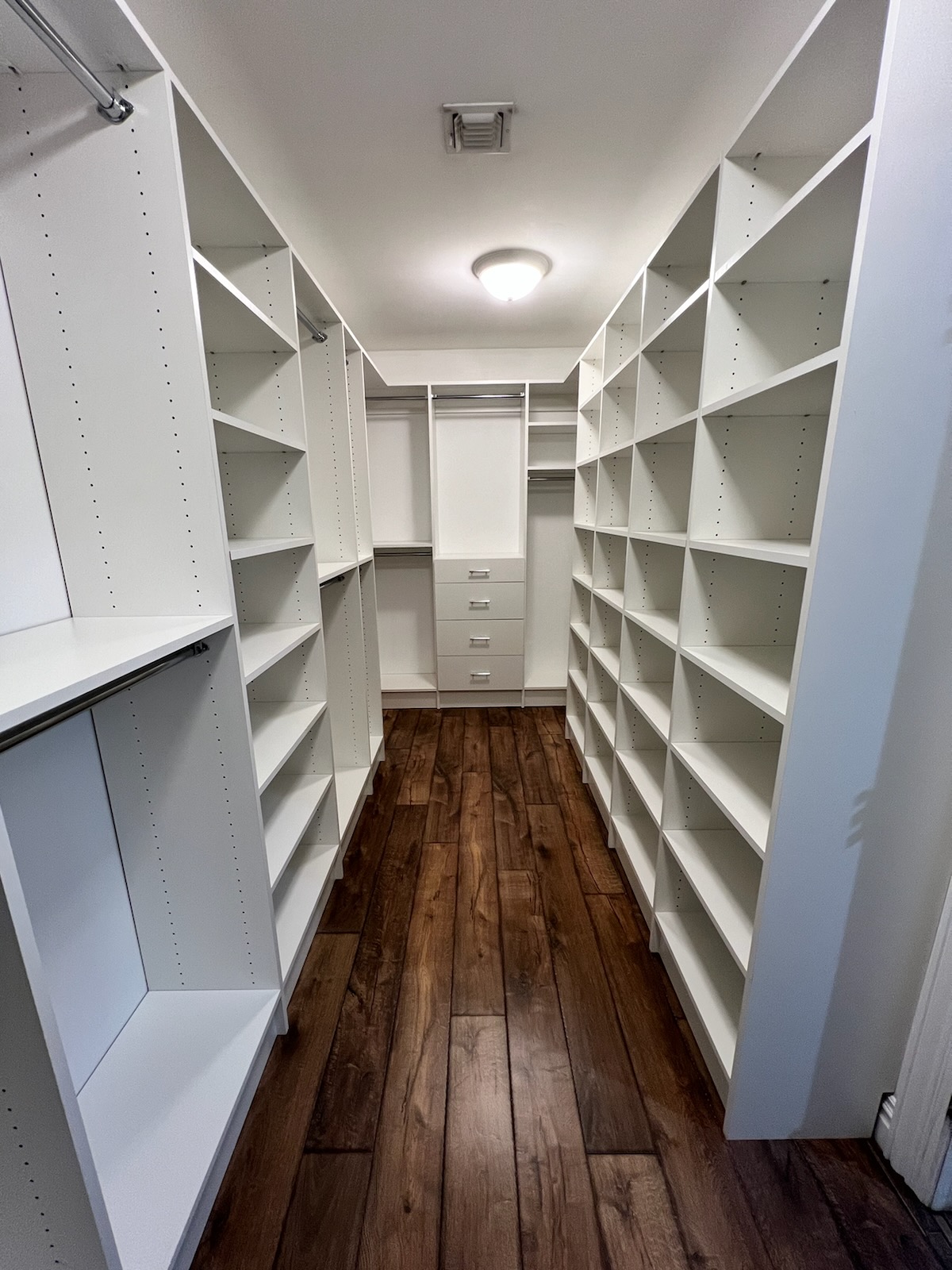 Beautiful custom closet after professional design and installation