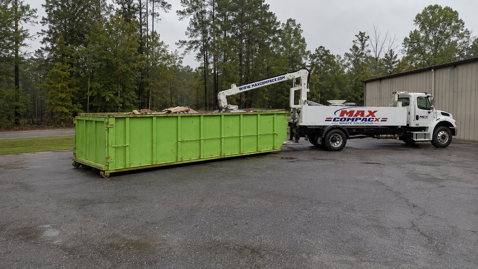 Max Compacx compaction truck and roll-off dumpster