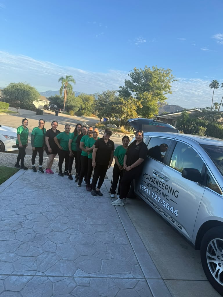 Sabrina and J Housekeeping Services team with company van in Jurupa Valley, CA