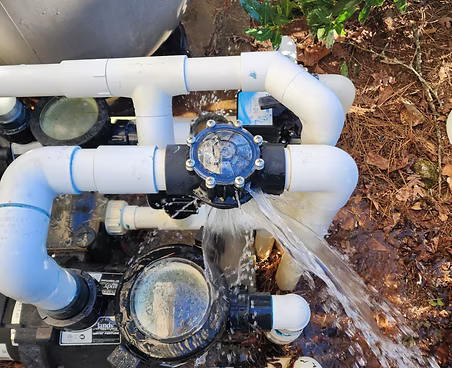 Leaking pool valve with water spraying out