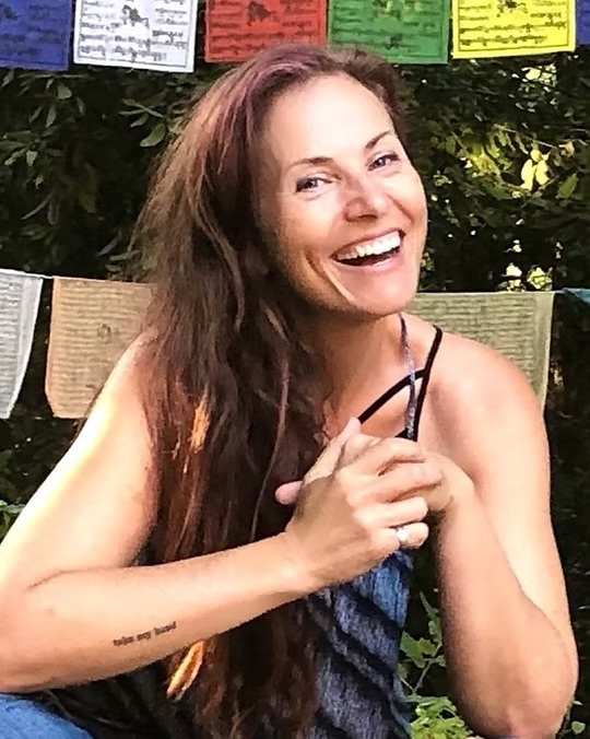 Kat Green, sound healing and breathwork facilitator, in the Wicklow woodland