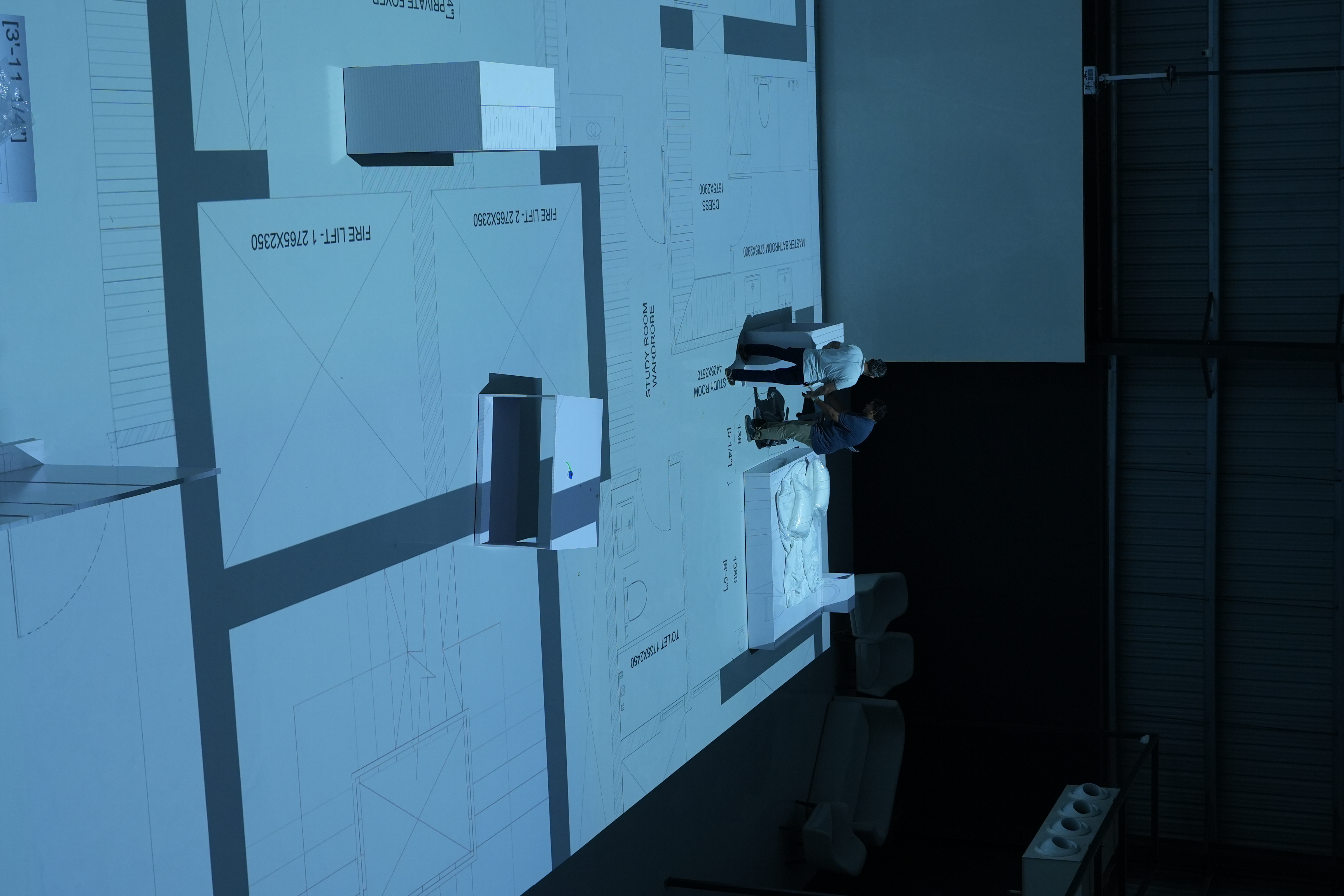 Client experiencing immersive architectural projection at SlateSpace