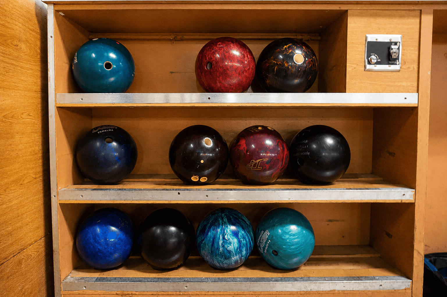 Paddock Bowl selection of colorful bowling balls available for kids and families