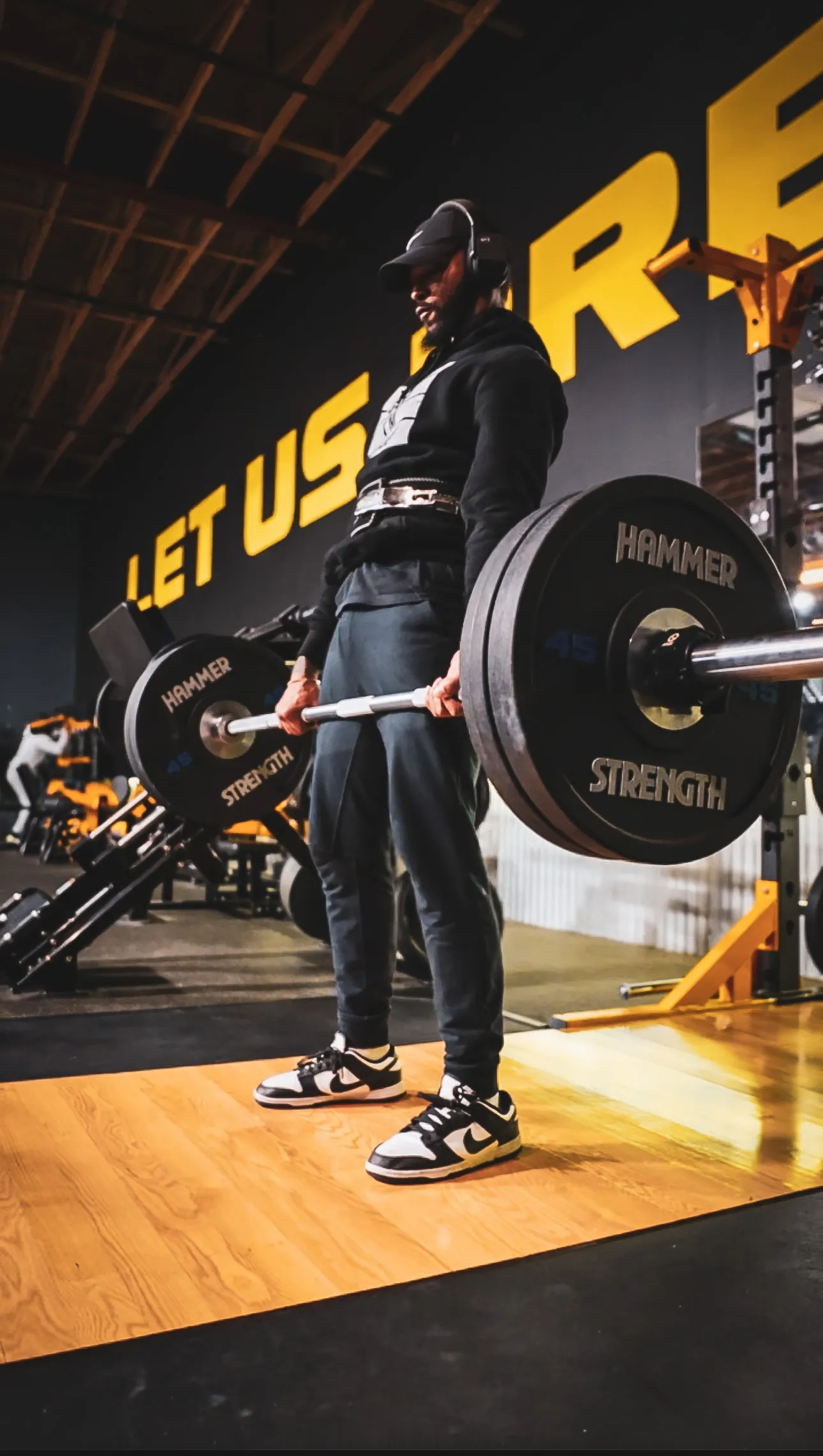 Jai'koa Parham performing a heavy deadlift at the gym, fitness and activewear performance campaign