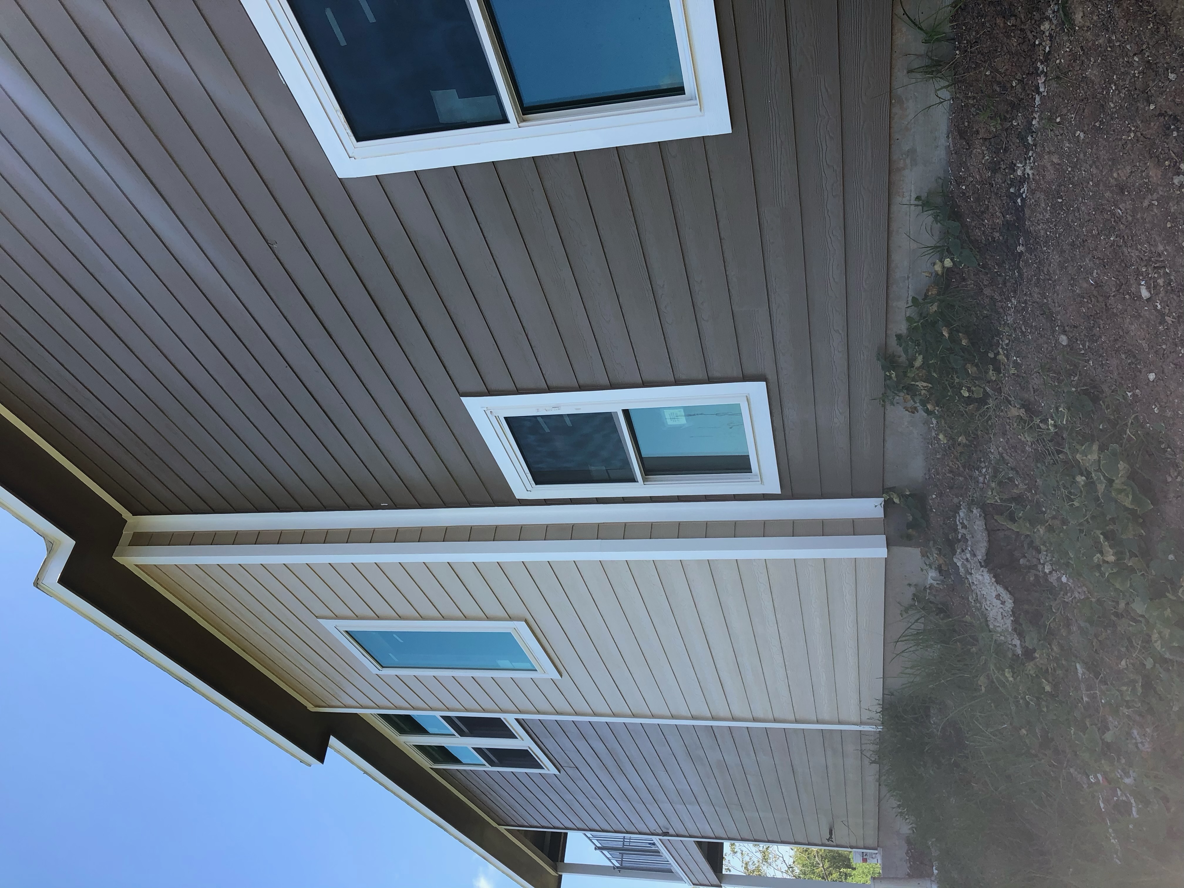 Exterior painting of a two-story home in Sugar Land, TX — photo 3 of 5