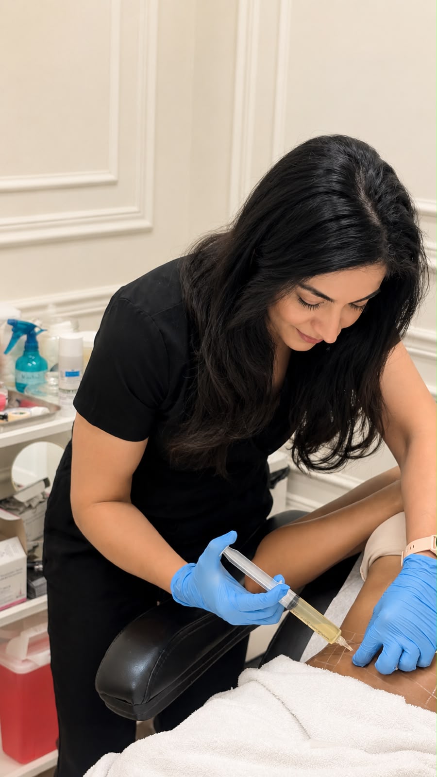 Nurse Moti performing precision clinical aesthetic treatment