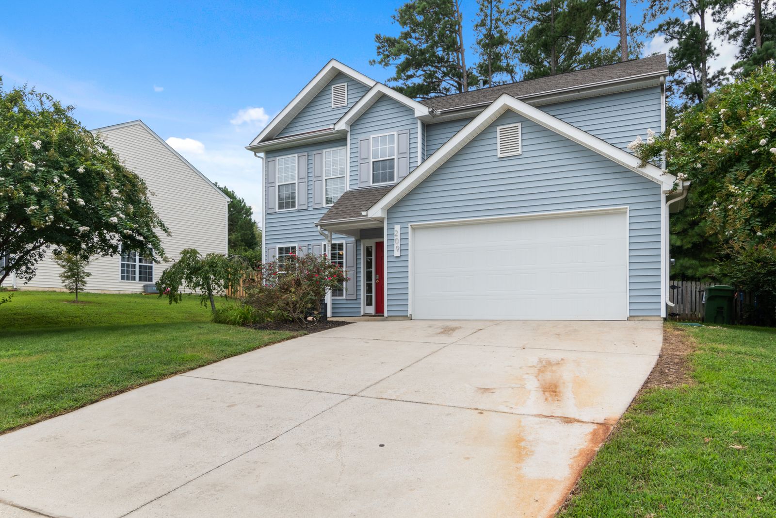 Two-story Texas family home with spacious driveway