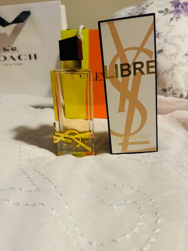 YSL Yves Saint Laurent Libre Eau De Toilette spray bottle with original presentation box and shopping bag