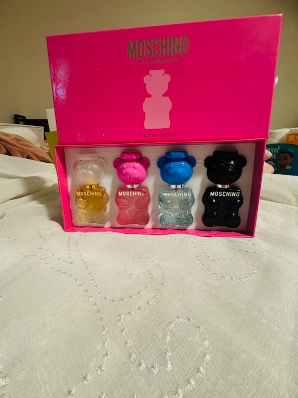 Moschino Toy perfume set with four bear-shaped bottles in vibrant hot pink presentation box