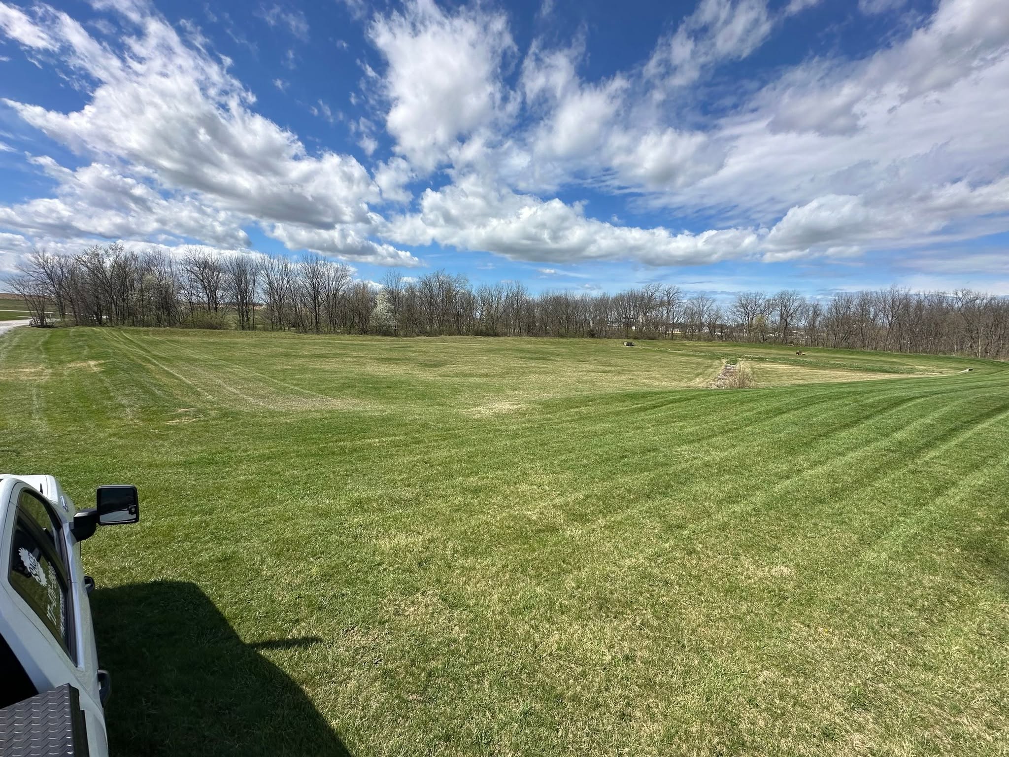 Large acreage lawn mowing service with professional striping