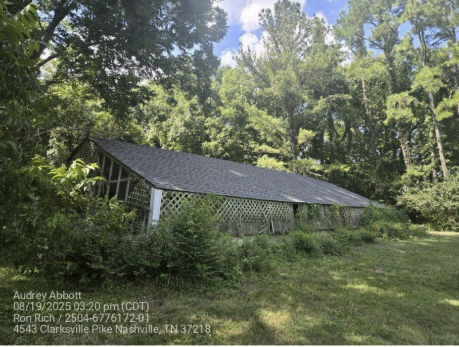 Brick ranch home with completed gray asphalt shingle roof replacement