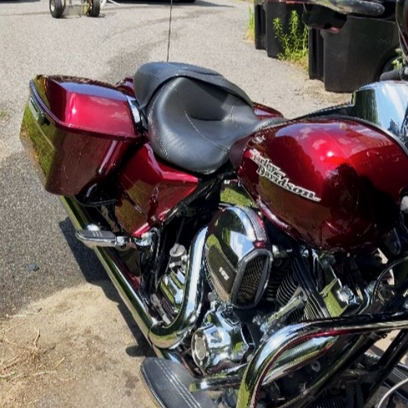 Harley Davidson motorcycle detailing with deep red candy paint in West Bridgewater MA