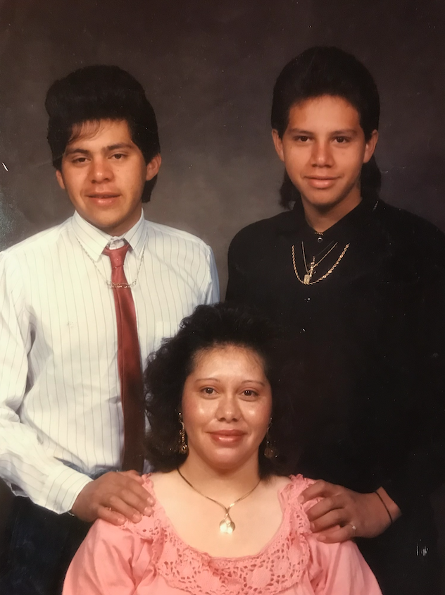 A young Juan M. Martínez with his mother and brother in an early family portrait