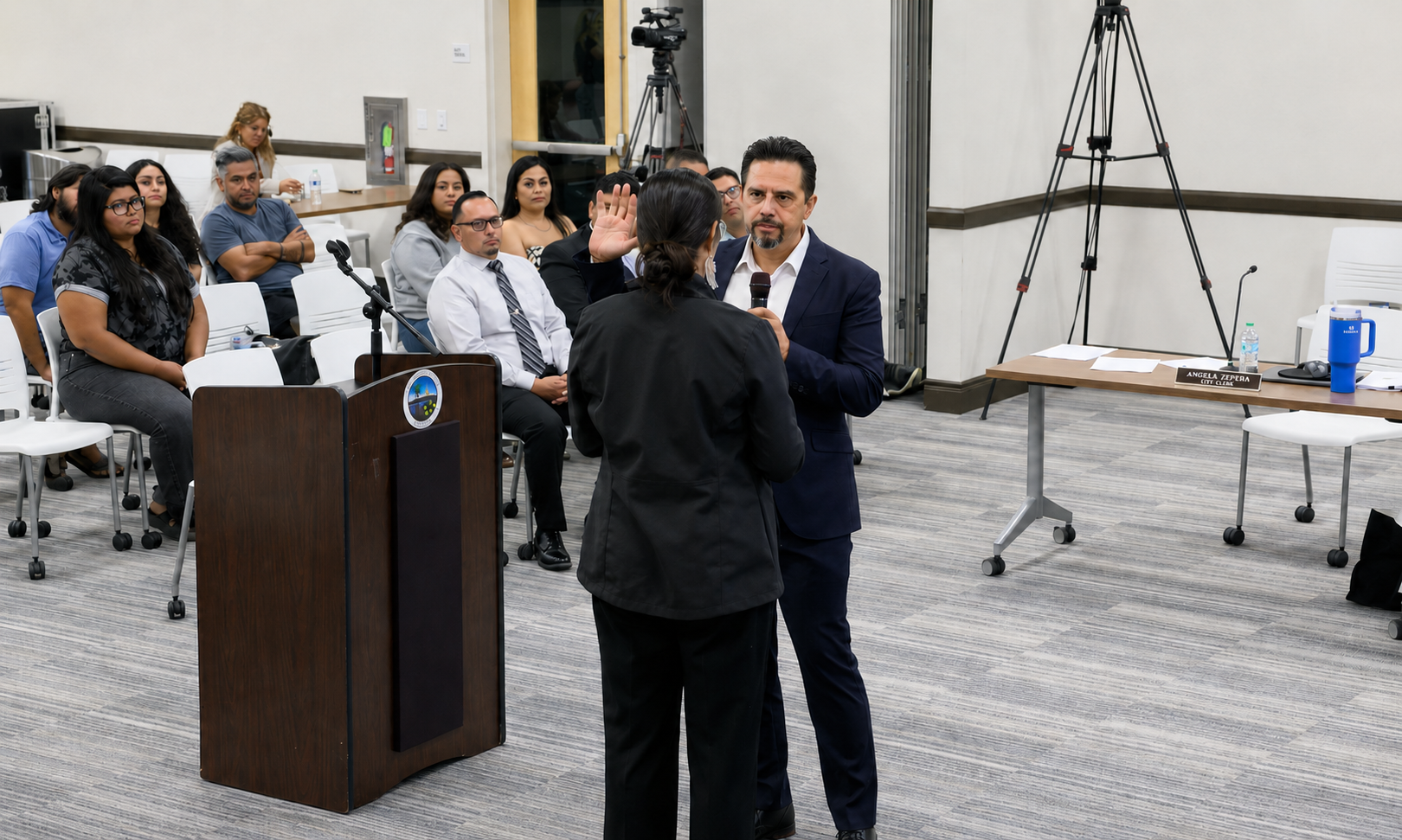 Juan M. Martínez being sworn in to the Coachella City Council by City Clerk Angela Zepeda
