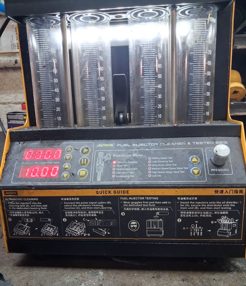 Fuel injector cleaning and testing equipment at Center Cities Automotive