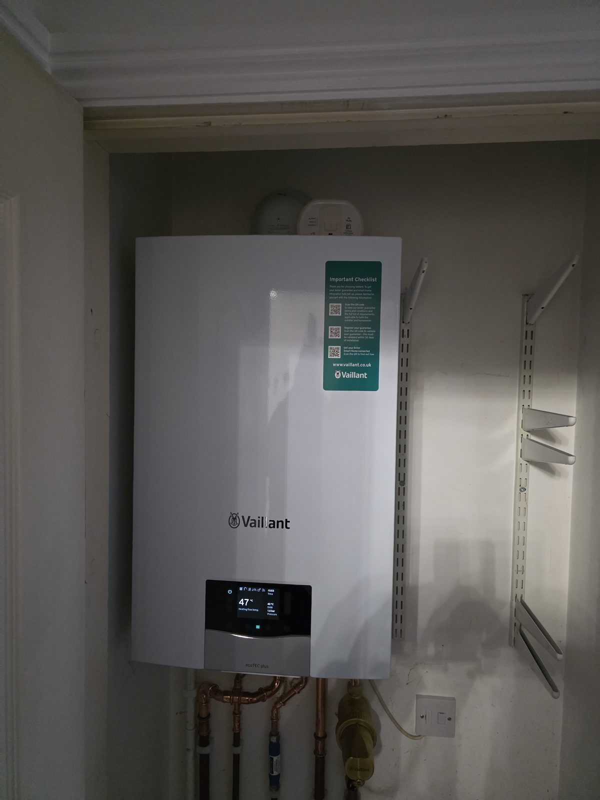 New Vaillant ecoTEC plus boiler installation showing neat copper pipework and magnetic filter.