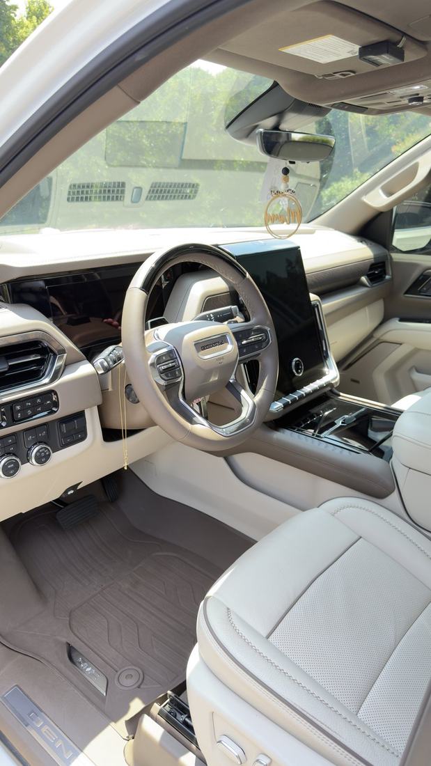 Chevrolet Traverse interior after a full interior detail with cleaned leather seats and carpets