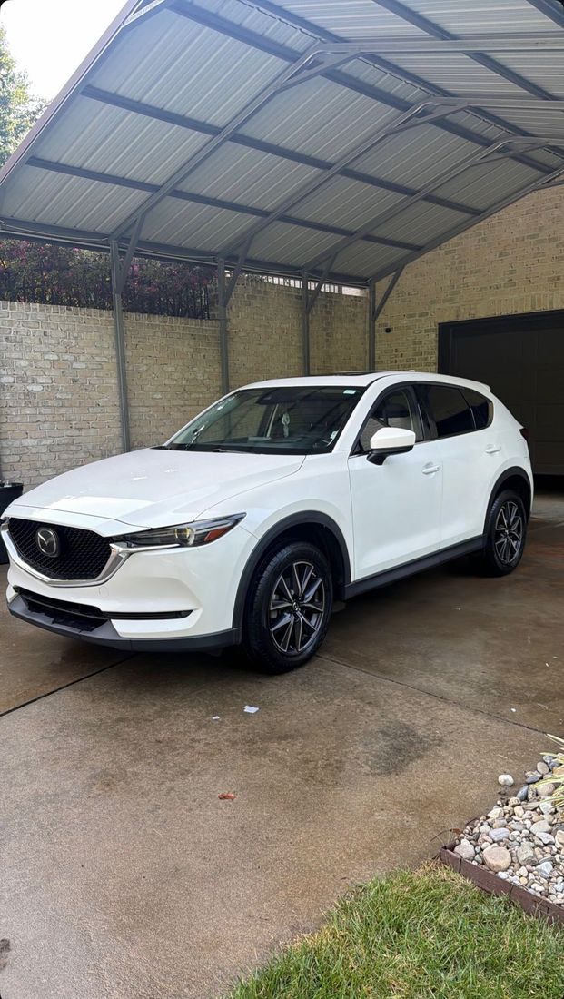 White Mazda CX-5 after a full exterior detail at a customer's home