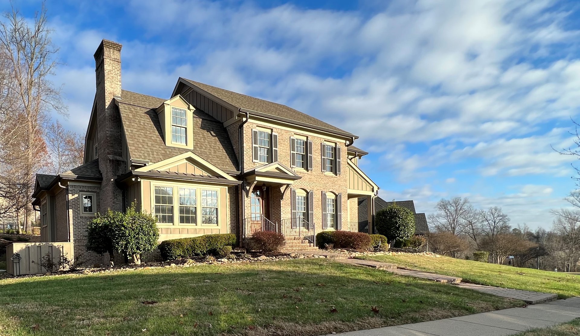 Established Knoxville home with brick exterior and manicured lawn