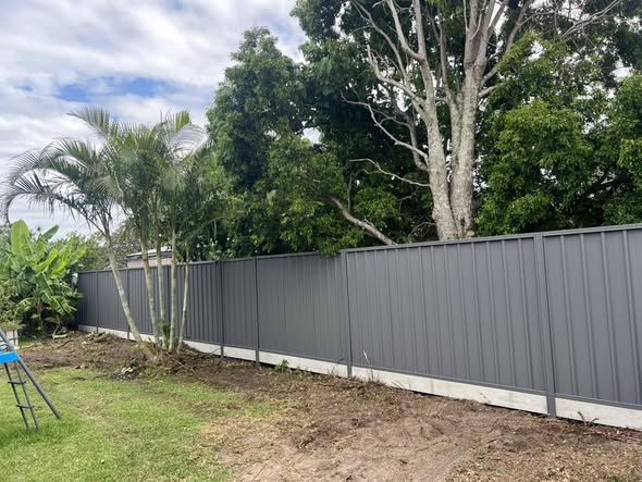 Long Monument Colorbond residential boundary fence installation – Moreton Bay — Residential Fencing Moreton Bay by Moreton Bay Fencing Services