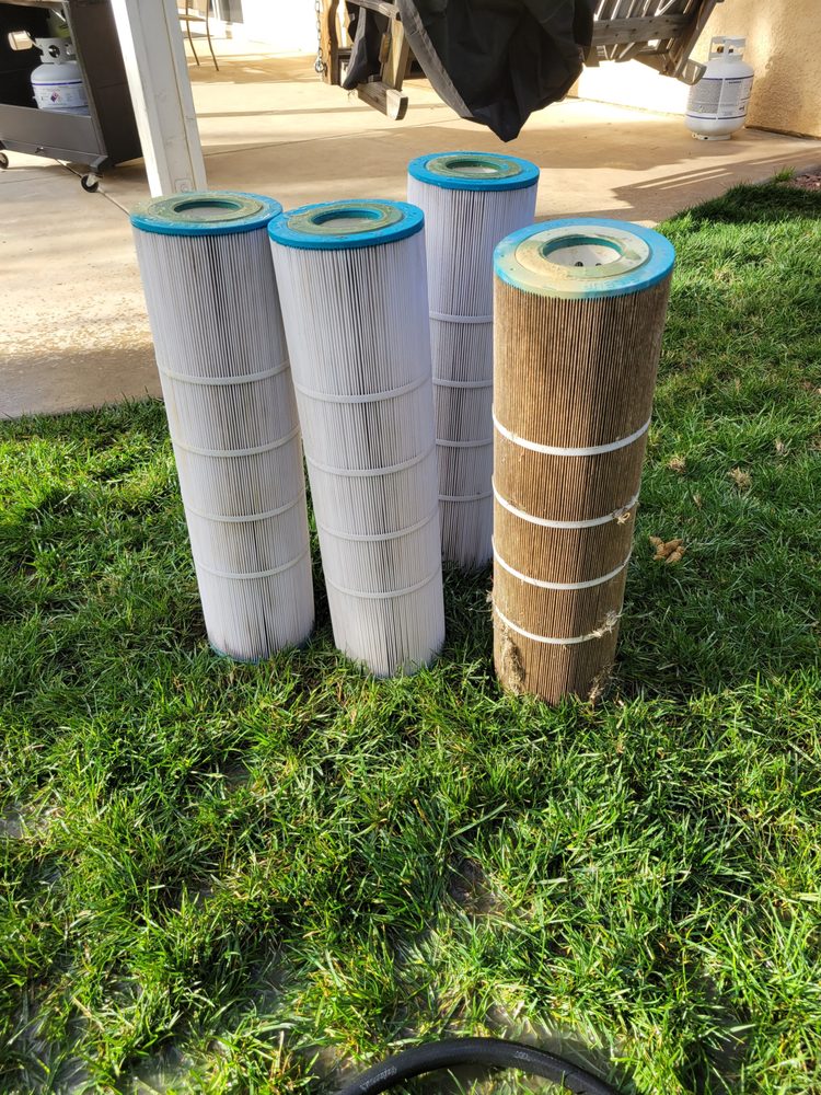 Clean and dirty pool filter cartridges showing before and after professional cleaning service in Winchester