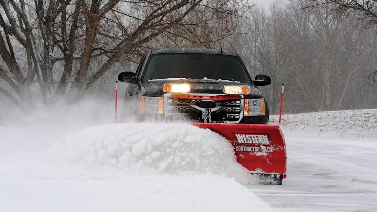 Grow Luck commercial plow clearing residential snow in Waukesha County