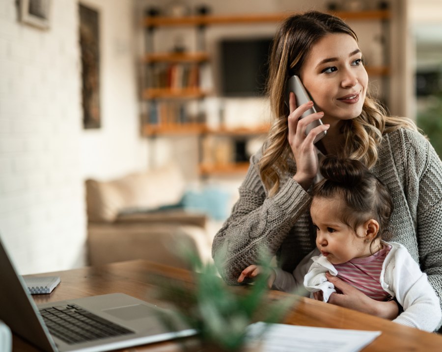 Mother consulting on phone for immigration bond assistance