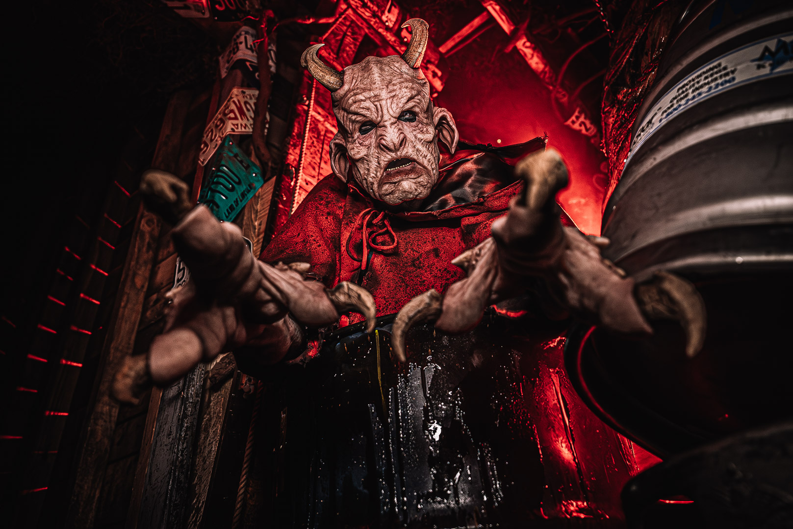 Executioner and scare clowns inside Massacre Haunted House in Montgomery, Illinois