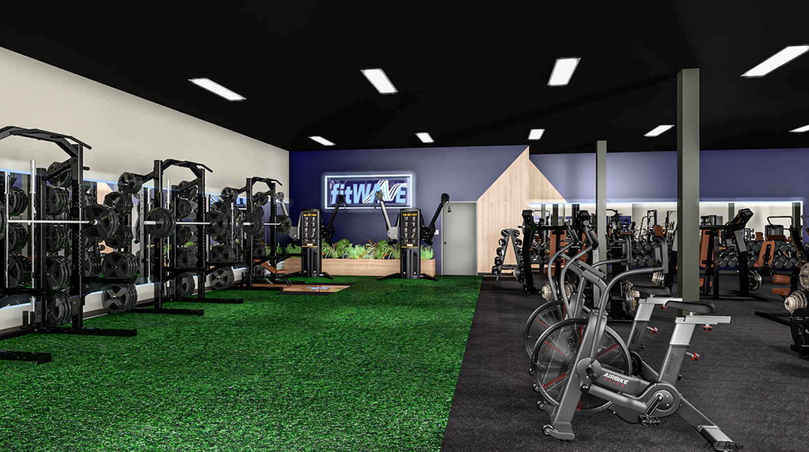 Training floor with fitWAVE area, turf, strength equipment, and cardio bikes
